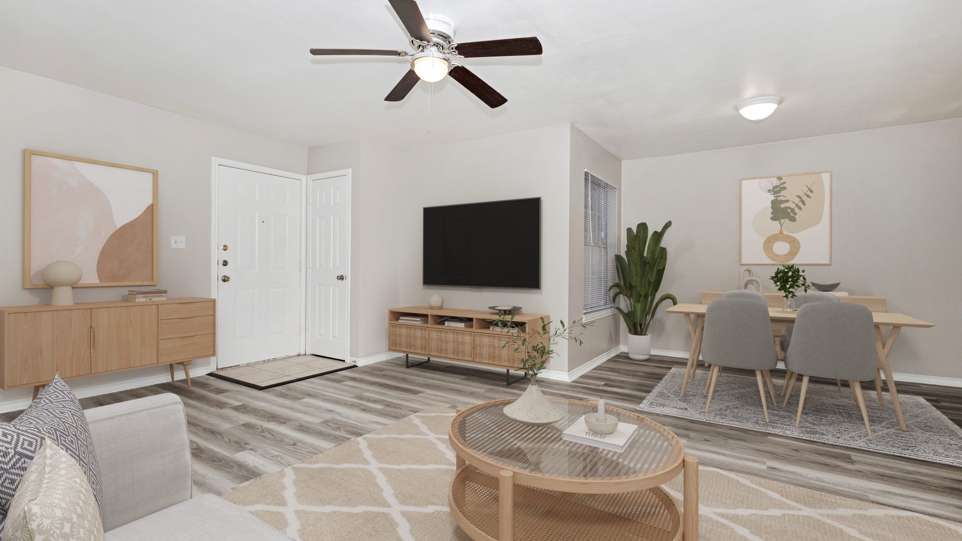 a living room filled with furniture and a tv