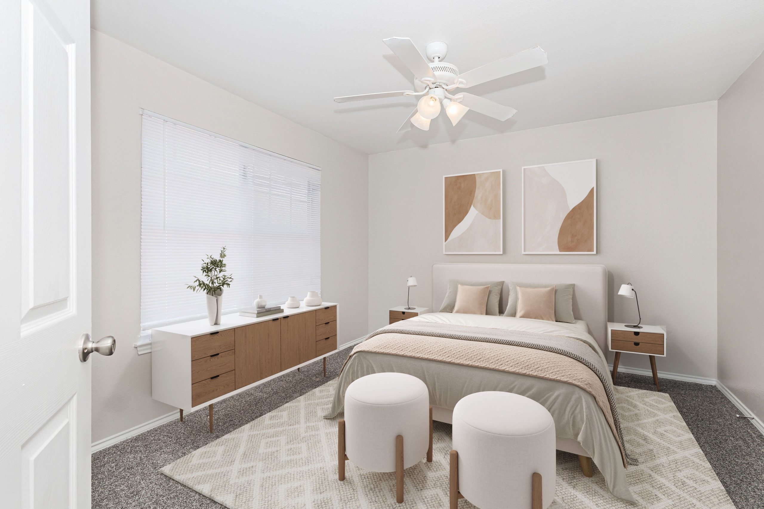 a hotel room with a bed and a dresser